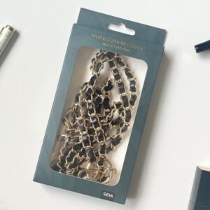 Telefonipael Noir & gold glam